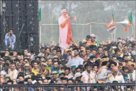  ?? RAVI KUMAR/HT ?? Supporters at PM Narendra Modi's rally in Sirmour, Himachal Pradesh, on Thursday.