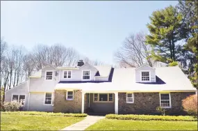  ?? Contribute­d photo ?? The Cape Cod house at 1265 Daniels Farm Rd., built in 1944, is a bit unusual for capes of its era, with all four bedrooms upstairs and a first-floor laundry. The custom-built, 2,489-square-foot home has many of its original features, including hardwood...