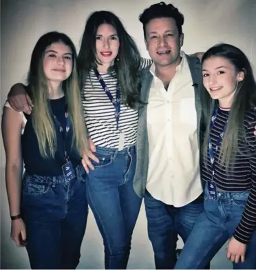  ??  ?? Selfie ban: Jamie and Jools Oliver with two of their daughters, Poppy, left, and Daisy