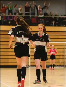  ??  ?? Ciara Brennan of St. Attracta’s celebrates with team-mate Jessica Casey after she scored their side’s second goal in the national final.