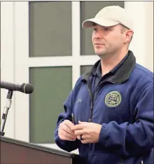  ?? / Adam Cook ?? Planning and Zoning Director James Davis discusses stormwater issues around the Catoosa County jail during the Dec. 4 Board of Commission­er’s meeting.