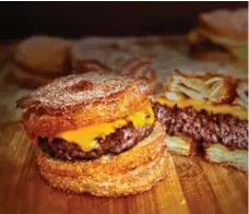  ??  ?? 2013: The cronut burger, a cheeseburg­er-croissant-donut fusion.