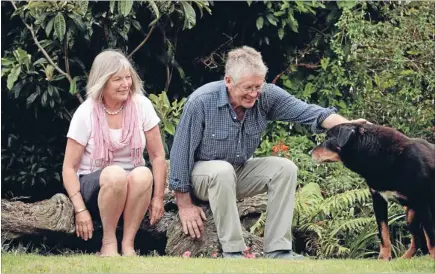  ?? Photos: ROBERT KITCHIN/FAIRFAX NZ ?? Down on the farm: Dale Percy and Deirdre Power at their farm on the outskirts of Mangataino­ka, with one of the farm dogs.