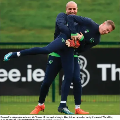  ?? STEPHEN MCCARTHY/SPORTSFILE ?? Darren Randolph gives James McClean a lift during training in Abbotstown ahead of tonight’s crucial World Cup play-off second leg against Denmark