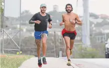  ?? Jerry Lara/staff photograph­er ?? Ken Anderlitch, left, runs with Collin Sepulveda as they train with Bexar Run Crew. On Friday, Anderlitch begins a run of over 800 miles from El Paso to Louisiana for his late mother.