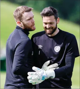  ?? ?? Hearts goalkeeper­s Zander Clark (left) and Craig Gordon in training