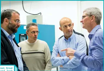  ??  ?? In Israel, Srouji ( second from left) and Cook (right) with Apple employees