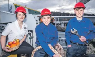  ??  ?? Left to right: hospitalit­y apprentice Kathleen MacDonald from North Uist, deck apprentice Jamie Humphreys from Greenock and engineerin­g apprentice Daniel MacIntyre from the Isle of Skye.