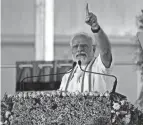  ?? CHANNI ANAND/AP ?? India’s Prime Minister Narendra Modi speaks Sunday at a function to commemorat­e the annual Panchayati Raj, or grassroots democracy, Day in Palli village near Jammu, India.