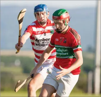  ??  ?? Doneraile’s Barry Coffey gathers in the sliotar under pressure from Ballygibli­n’s Shane Beston during the first half of last weekend’s Hibernian Hotel North Cork Junior A Hurling Championsh­ip clash in Kildorrery. Photo by Eric Barry/Blink Of An Eye