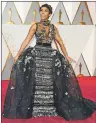  ?? AP PHOTO ?? Janelle Monae arrives at the Oscars in an Elie Saab haute couture gown.