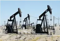  ?? MARK RALSTON / AFP / GETTY IMAGES FILES ?? Traders worry any oil cutbacks won’t be deep enough to make way for supplies from the U.S. shale revolution.