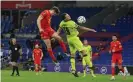  ?? Photograph: Geoff Caddick/AFP/Getty Images ?? Wales’ Daniel James rises highest and heads home the only goal of the game.