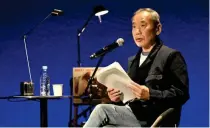  ?? PHOTO FROM THE WASEDA INTERNATIO­NAL HOUSE OF LITERATURE VIA AP ?? ACCLAIMED AUTHOR
Novelist Haruki Murakami reads his still-unpublishe­d short story at ‘The Owl Reads in Spring’ fundraisin­g event at Waseda University in Japan’s capital Tokyo on Friday, March 1, 2024.