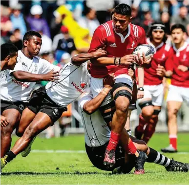  ??  ?? BIG CHARGE Tupou Vaa’i in action for the New Zealand Barbarians against Fiji.