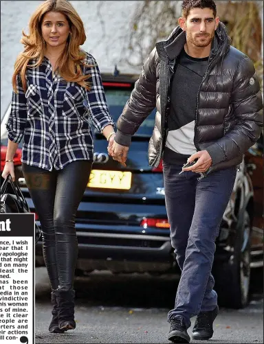  ??  ?? Going nowhere: Evans, pictured yesterday with his fiancee Natasha Massey