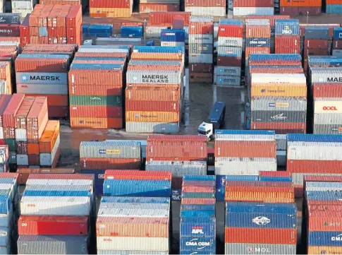  ??  ?? Shipping containers loaded up for export to the European Union face a new landscape of regulation­s.