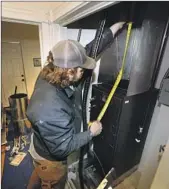  ?? David Zalubowski Associated Press ?? A HEAT PUMP is installed in an 80-year-old rowhouse in northwest Denver in January.