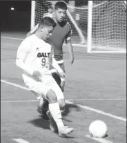  ?? MIKE BUSH/NEWS-SENTINEL ?? Galt forward Davian Marquez (9) and a Lindhurst race toward the ball in the first half of Thursday's SacJoaquin Section Division IV boys soccer playoff game at Walker Park.