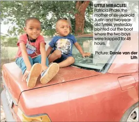 ??  ?? LITTLE MIRACLES: Patricia Phale, the mother of six-year-old Justin and two-yearold Tyress, yesterday pointed out the boot where the two boys were trapped for 48 hours.
Picture: