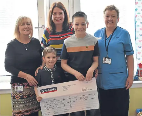  ??  ?? THE paediatric renal and gastro teams at Ninewells Hospital have benefited from a donation from Broughty Ferry couple Gillian and Norrie Mill.
The couple donated £1,185 to be split between the teams as a thank you for care given to their son Logan...