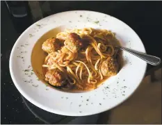  ??  ?? Napoletana Pizzeria’s menu features more than just pizza, such as linguini with homemade meatballs and marinara.