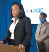  ?? ASHLEE REZIN GARCIA/SUN-TIMES ?? Mayor Lori Lightfoot looks on Wednesday as Chicago Public Schools CEO Janice Jackson discusses new reforms to the school resource officer program.
