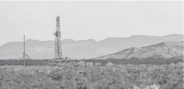  ?? Michael Ciaglo / Houston Chronicle file ?? An Apache rig sits north of the Davis Mountains. Apache’s Navneet Behl says the company is working with utilities to take power to its remote Delaware Basin sites.
