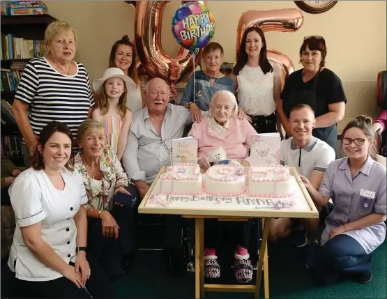  ??  ?? Anna Maguire celebratin­g her 105 birthday with members of staff and family at the Boyne Valley nursing home and her magnificen­t McCloskey’s cake.