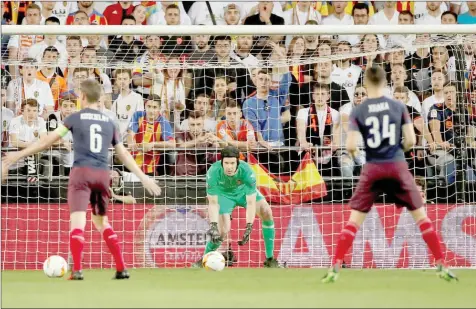  ??  ?? File photo shows Arsenal’s Petr Cech in action as two balls are on the pitch. — Reuters photo