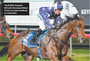  ??  ?? TALENTED: Brendon McCoull wins aboard Blaze Forth in an open handicap in Launceston.