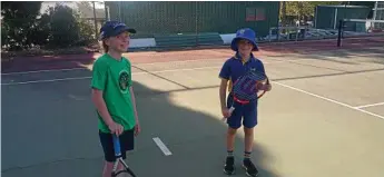  ?? Photo: Contribute­d ?? GAME ON: Sophie Stapleton and Harry Haddin prepare for a game of Orange Ball tennis.