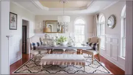  ?? COURTESY OF HARVEST HOUSE PUBLISHERS ?? Most homes today don’t stick rigidly to one style, says KariAnne Wood, author of “The DIY Style Finder.” This traditiona­l dining room, for instance, has many contempora­ry touches.