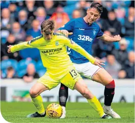  ??  ?? Ryan Gauld in action for Hibs against Rangers’ Nikola Katic