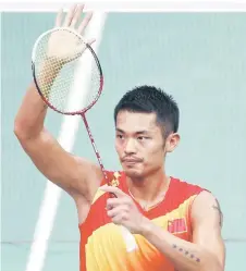  ?? — AFP photo ?? Lin Dan celebrates winning against Japan’s Sho Sasaki during their mens singles badminton quarterfin­als match during the London 2012 Olympic Games at the Wembley Arena in this Aug 2, 2012 file photo.