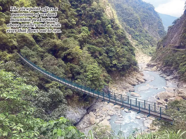  ??  ?? The viewpoint offers a panorama of verdant mountain peaks rising above a valley and a wide river that flows out to sea. A long hanging bridge above a river is reminiscen­t of our Cordillera landscape features.