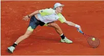  ?? CHRISTOPHE ENA THE ASSOCIATED PRESS ?? Denis Shapovalov, pictured, lost, 7-5, 6-7 (5), 6-3, 3-6, 8-6, to Roberto Carballes Baena in a second-round match Thursday.