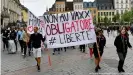  ??  ?? Around 114,000 people protested across France on Saturday against stricter vaccinatio­n rules in the country