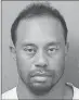  ?? Associated Press photo ?? This image provided by the Palm Beach County Sheriff's Office on Monday shows Tiger Woods after his arrest for DUI.