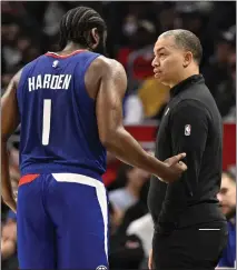  ?? ALEX GALLARD — THE ASSOCIATED PRESS ?? Guard James Harden, coach Tyronn Lue and the Clippers are in fourth place in the Western Conference but only one game out of the top spot.