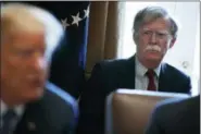  ?? EVAN VUCCI — THE ASSOCIATED PRESS ?? National security adviser John Bolton listens as President Donald Trump speaks during a cabinet meeting at the White House, Monday in Washington.