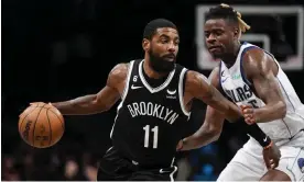  ?? Dallas Mavericks. Photograph: John Minchillo/AP ?? Brooklyn Nets star Kyrie Irving drives to the lane during an October game against the