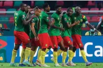  ?? ?? Hosts…Cameroon players celebrate during their opener against Burkina Faso