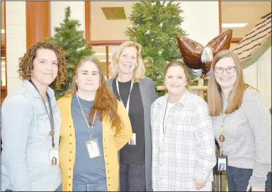  ?? (NWA Democrat-Gazette/Rachel Dickerson) ?? Cooper Elementary WIN Team (from left) Tia Glover, Robbie Stratman, Kay Mills, Heather Roberts and Stefanie Pick.