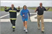  ??  ?? Fire safety officer Angus John Smalley, event organiser Carol Flett and air ground operator Nangie Morrison on the Coll runway.