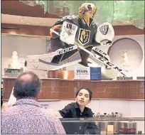  ??  ?? The Bellagio Patisserie honors the Golden Knights with a nearly 5-foot-tall chocolate sculpture of goaltender Marc-Andre Fleury.