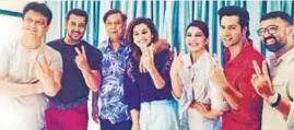  ?? PHOTO: INSTAGRAM/VARUNDVN ?? Left: Sajid Nadiadwala and Salman Khan (seated); Above: A group photo from the sets, including leading man Varun Dhawan (in red), David Dhawan (in blue), and leading ladies Taapsee Pannu (fourth from left) and Jacqueline Fernandez.