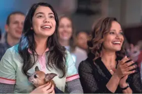  ?? ALLYSON RIGGS/NETFLIX ?? Auli’i Cravalho, left, and Judy Reyes in a scene from “All Together Now.”