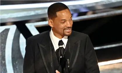  ?? ?? Will Smith accepts the Oscar for best actor. Photograph: Rob Latour/REX/Shuttersto­ck