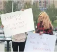  ??  ?? HOSTAGE SITUATION: Students hold up banners in support of Veysel Akcay.